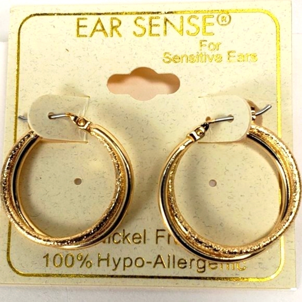 Stunning Intertwined Gold Tone Hoop Earrings with Textured and Polished Finish